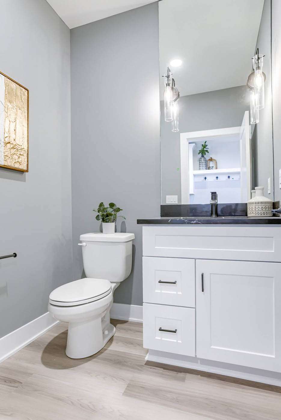 Half bathroom with white cabinetry | Coventry Ridge I | Kimberly Cahoy Design